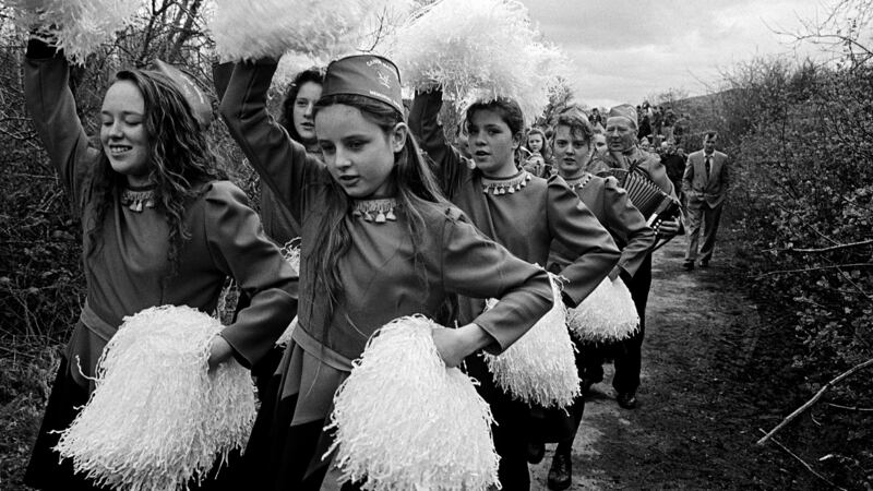 Cheerleading girls marching down a road spontaneously opened. Photograph: Copyright Tony O’Shea