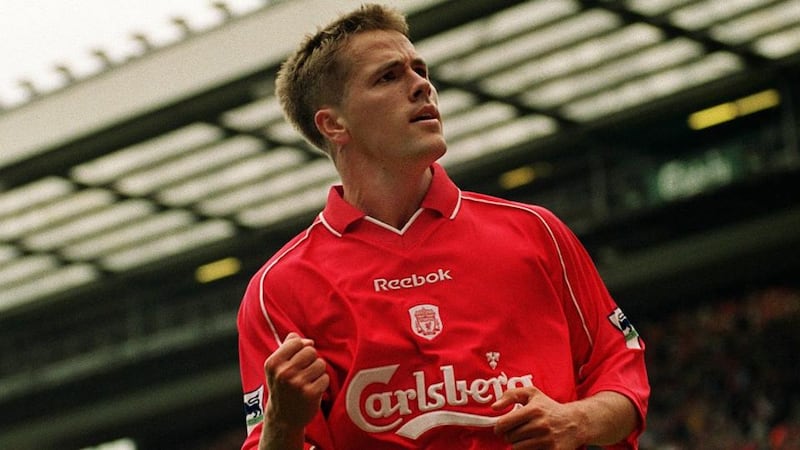 Michael Owen celebrates scoring for Liverpool in the  2000/01 season.