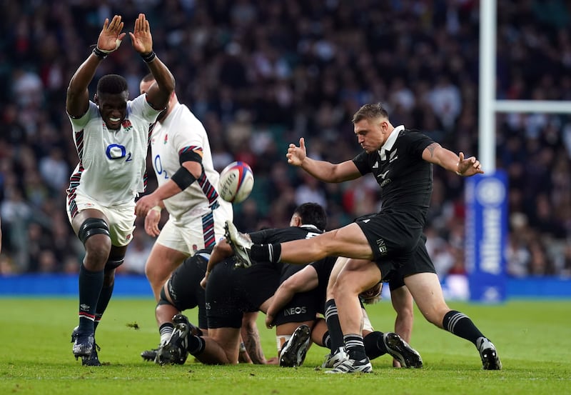 New Zealand's Cortez Ratima kicks clear during the game against England. The All Blacks kick more often than would be expected given their reputation. Photograph: Gareth Fuller/PA Wire 