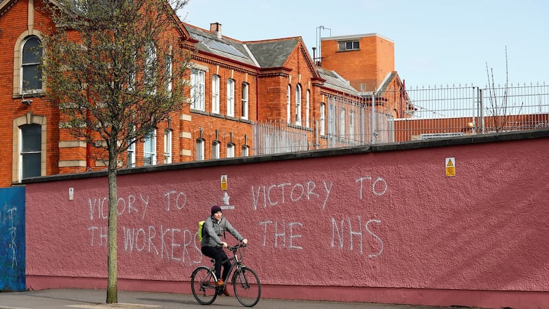 Graffiti supporting the NHS on a wall of the Royal Victoria Hospital in Belfast. Photograph: Jason Cairnduff/Reuters