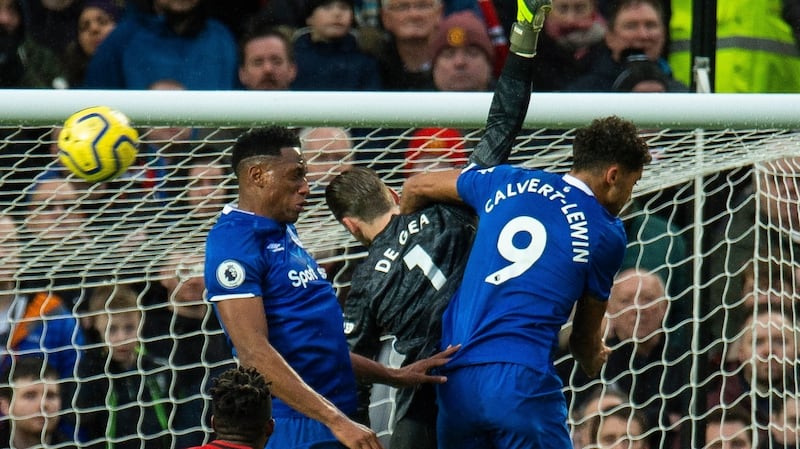 Dominic Calvert-Lewin clashes with David de Gea in the build-up to Everton’s opener against Manchester United. Photograph: Peter Powell/EPA