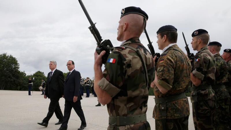 Francois Hollande and Joachim Gauck  attend a ceremony to commemorate the centenary of the start of the first World War One  at the Vieil Armand ‘Hartmannswillerkopf’ battlefield in the Alsace region. Photograph: Christian Hartmann/Reuters