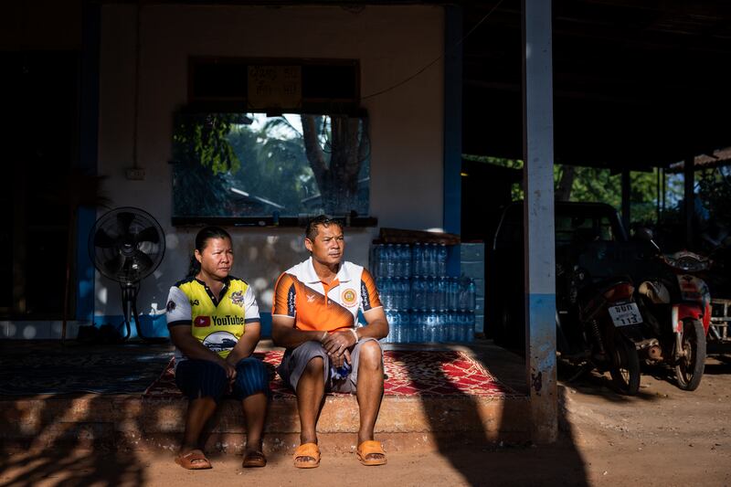 Watsana Yojampa and Pornchai Angkaew, whose son was working in Israel as a farm hand when he and dozens of Thais were killed or taken hostage in the October 7th attack by Hamas. Photograph: Lauren Decicca/New York Times
                      