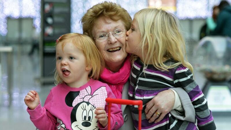 Ella (3) and Katey (5) Zwan , with their grandmother Anne Killian, Ratoath, Co Meath, before boarding a flight to Holland having spent Christmas in Ireland. Photograph: Eric Luke / The Irish Times