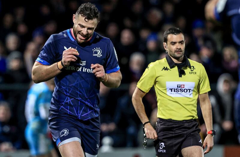 Leinster’s Robbie Henshaw alongside French referee Pierre Brousset. Photograph: Dan Sheridan/Inpho
