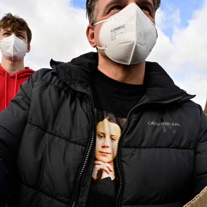 A demonstrator wearing a shirt depicting Greta Thunberg during a Fridays for Future global climate strike in Berlin. Photograph: John MacDougall/AFP via Getty