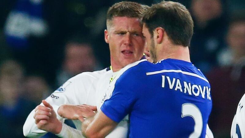 Branislav Ivanovic (right) of Chelsea grapples with Everton’s James McCarthy   at Stamford Bridge. Photograph: Eddie Keogh / Reuters