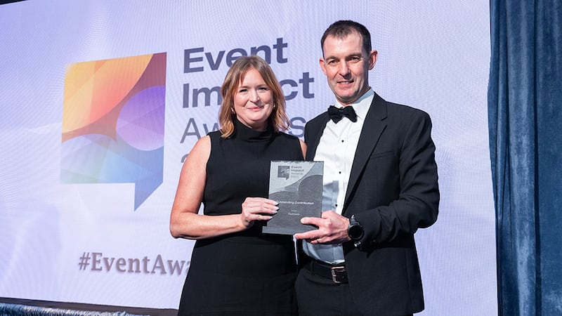 June O'Byrne-Prior, awards judging coordinator, presents the outstanding contribution award to Paul Davis, Davis Events Agency