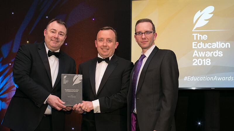 Robert Farrell, Digital Marketing Course Director, Digital Marketing Academy of Ireland presents Best Use of Educational Technology / ICT Initiative of the Year Award to Ulster University Team.