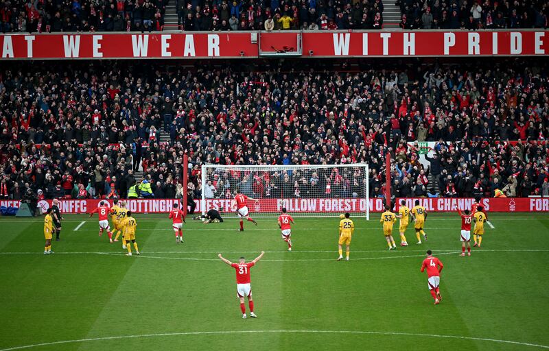 Chris Wood completes his hat-trick from the penalty spot to score Nottingham Forest's fifth goal during the Premier League game against Brighton at the City Ground. Photograph: Michael Regan/Getty Images