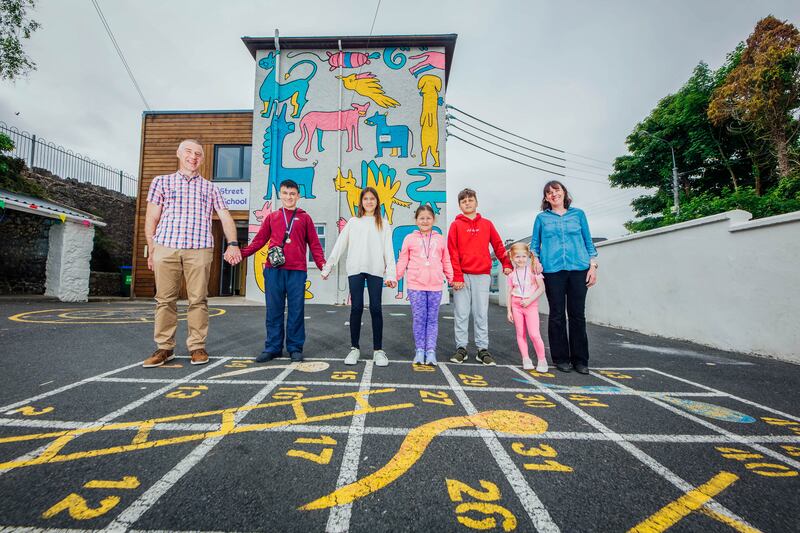 Principal Niall West and teacher Ciara Looney of Church Street National School in Rathkeale, Limerick: the school admitted eight Ukrainian students recently. Photograph: Brian Arthur