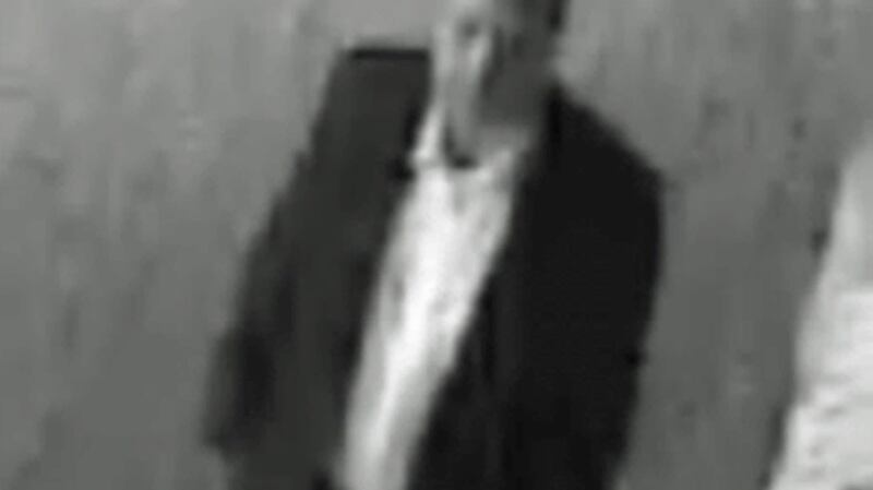 The PSNI would like to speak to this individual in connection with the assault. He is described as being in his 40s, of heavy build and wearing a white shirt along with a dark suit-jacket and trousers. Photograph: PSNI/PA