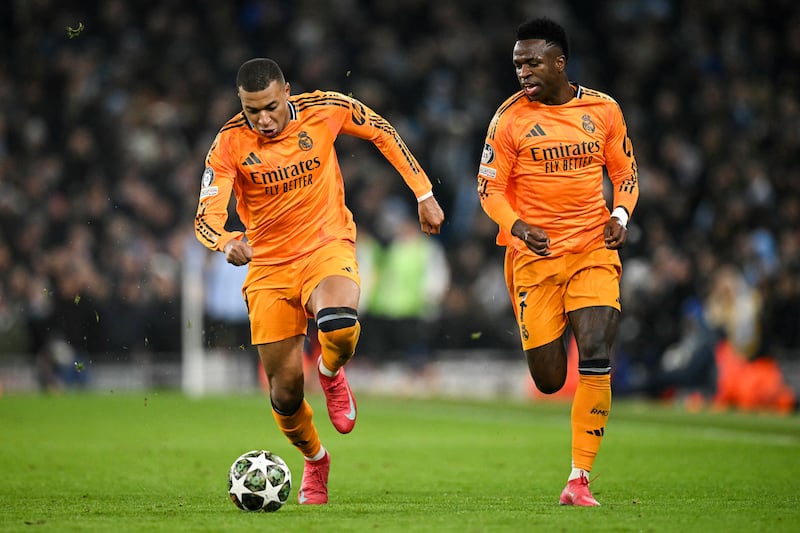 Real Madrid's Kylian Mbappé and Vini. Photograph: Oli Scarff/Getty