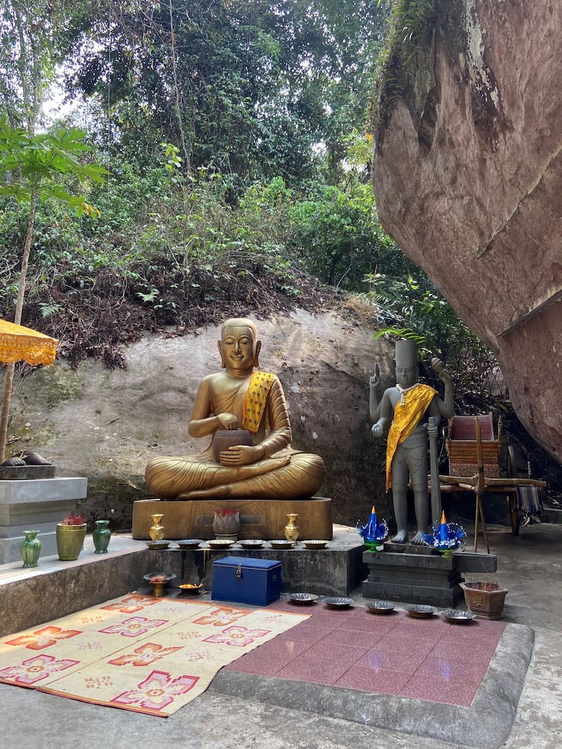 One of the many Buddhas on mountaintops near Siem Reap