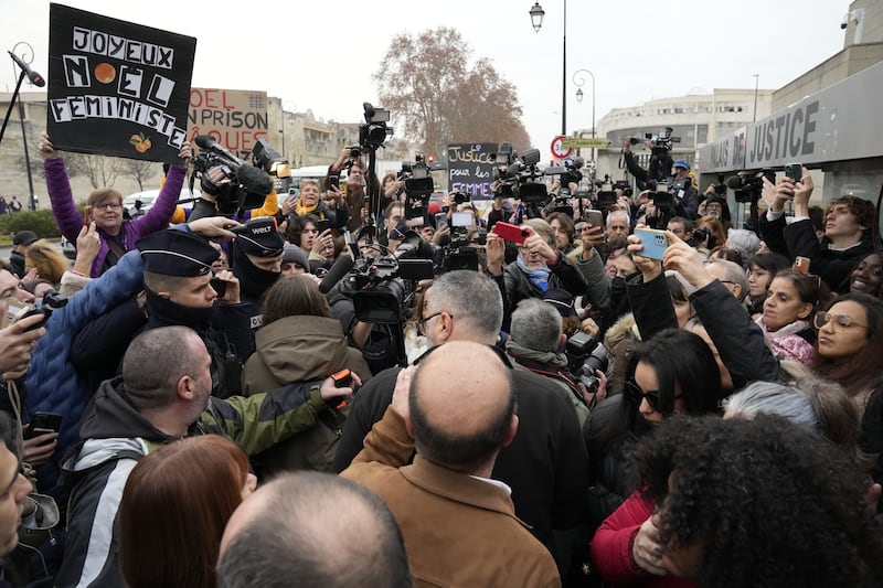 Members of the media and public gather as Gisèle Pelicot arrives in front of the courthouse in Avignon, France. Photograph: Julien Goldstein/Getty Images