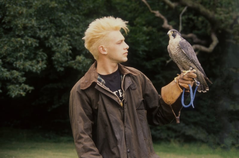 Chris Packham holding a peregrine falcon at the time he was presenting The Really Wild Show. Photograph: Tim Roney/Getty Images