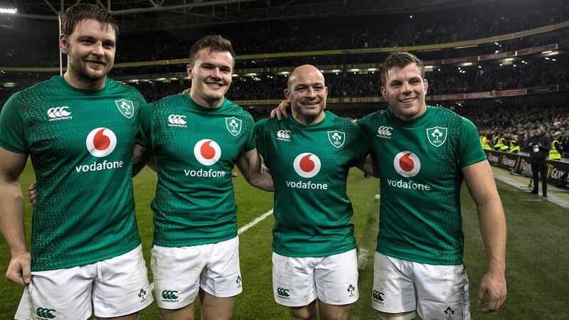 Ireland’s Ulster contingent  Iain Henderson, Jacob Stockdale, Rory Best and Jordi Murphy celebrate winning the game. Photograph: Billy Stickland/Inpho