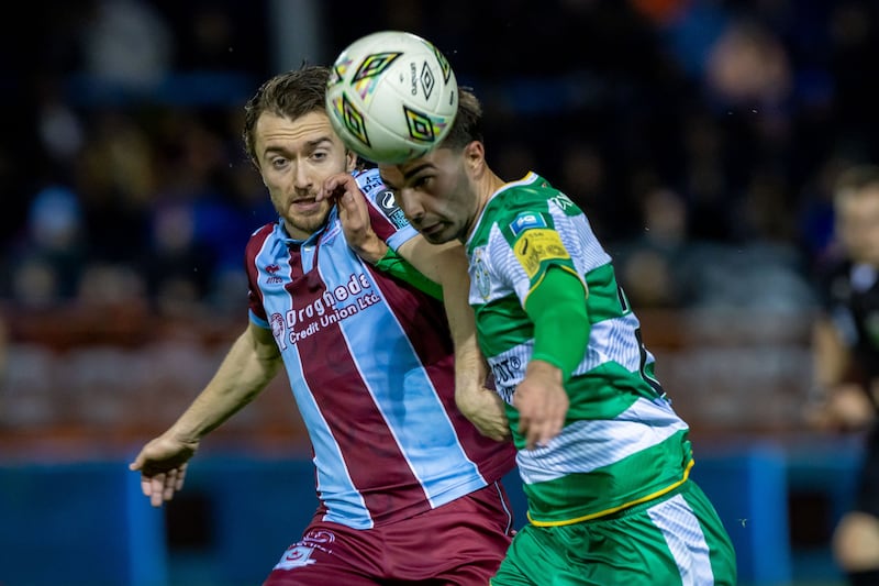 Drogheda United’s Darragh Markey with Daniel Madroiu of Shamrock Rovers. Photograph: Morgan Treacy/Inpho