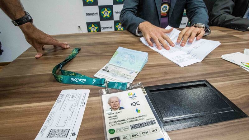 Pat Hickey’s passport, air ticket and accreditation are show during a police press conference in  Rio de Janeiro on August 17th, 2016. Photograph: Morgan Treacy/Inpho