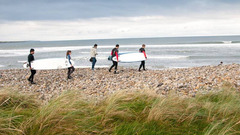 Web Summit attendess took part in a range of activity sports including stand up paddling, kayaking, kite boarding and surfing at the Surf Summit in Sligo. Photograph: Andrew Kilfeather