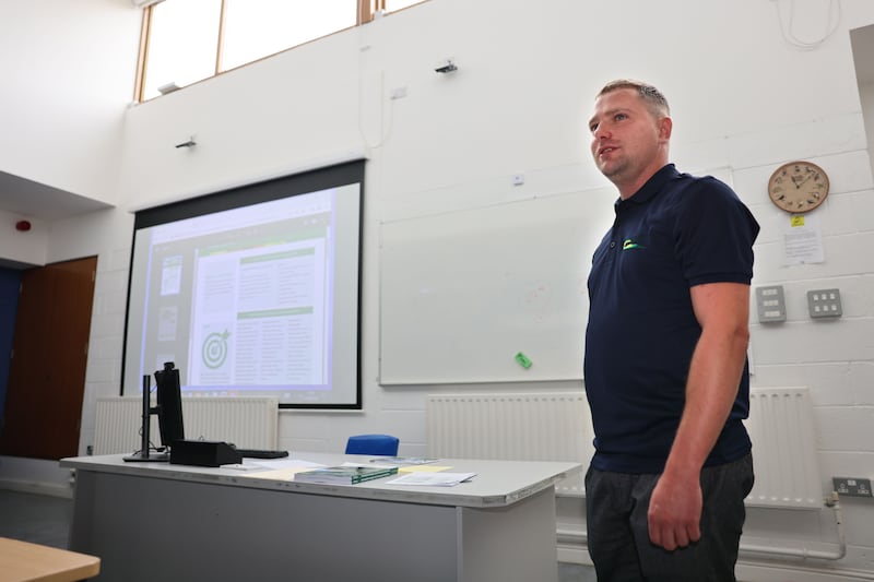 Teacher Alastair Pollock in the classroom at Ballyhaise. Photograph: Dara Mac Dónaill 