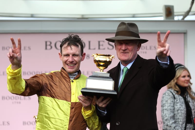 Paul Townend and trainer Willie Mullins with the Gold Cup Trophy. Photograph: Steven Paston for The Jockey Club/PA Wire