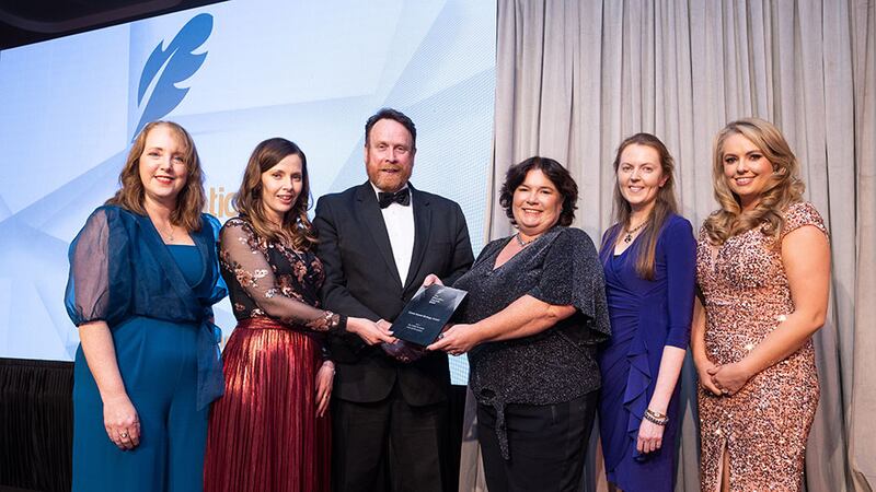 Declan Allen, awards judge, presents the Career Impact Strategy Award to ATU Galway team 