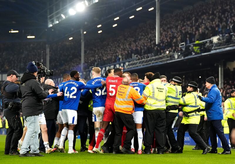 Liverpool's Curtis Jones and Everton's Abdoulaye Doucoure are separated by team-mates after brawl. Photograph: Nick Potts/PA