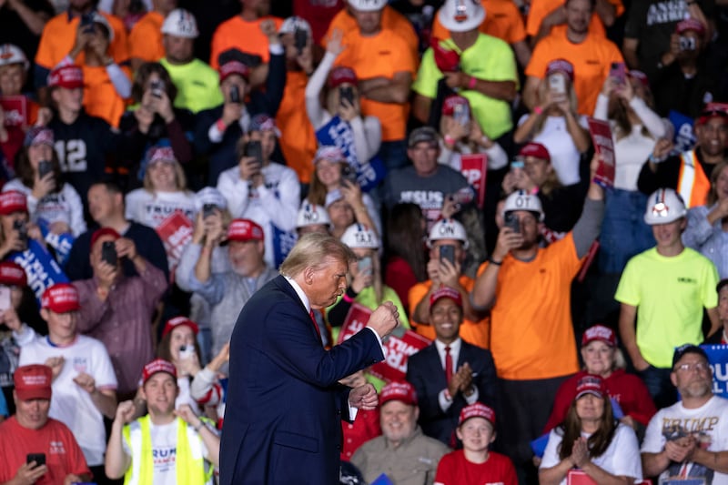 Former US president Donald Trump leaves following his closing campaign event at Van Andel Arena in Grand Rapids, Michigan Photographer: Sarah Rice/Bloomberg