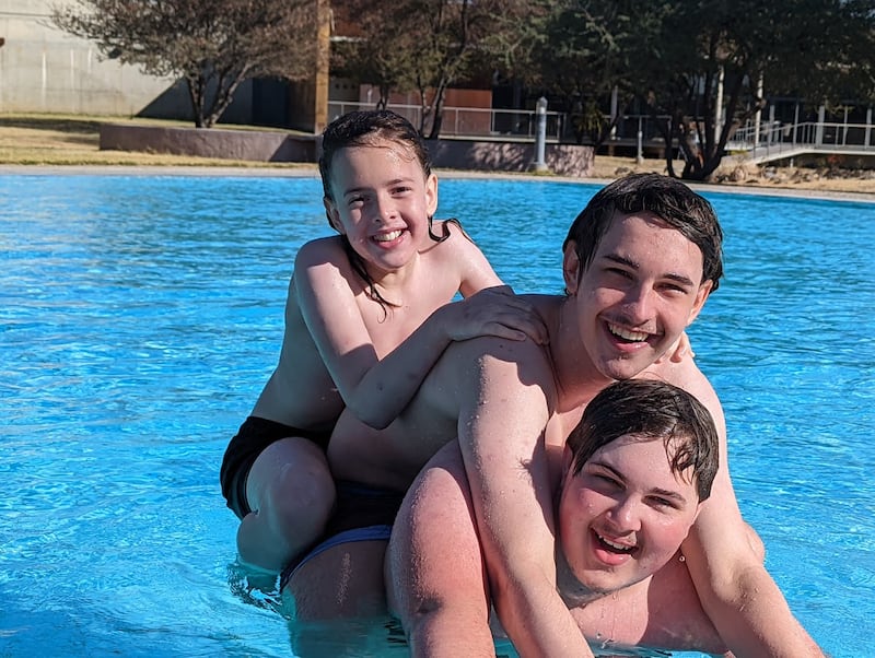 Corban Bruwer (right) with his brothers, Conlan and Callan, two months before being diagnosed