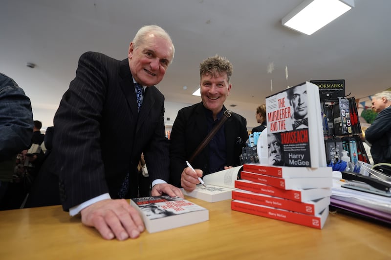 Former taoiseach Bertie Ahern and Irish Times reporter Harry McGee in the Gutter Bookshop, Temple Bar on Wednesday for the launch of McGee’s new book The Murderer and the Taoiseach. Photograph: Nick Bradshaw