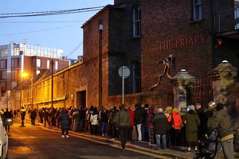 Queues form from early in the morning at the Capuchin Day Centre on Bow Street in Dublin. Photograph: Dara Mac Dónaill





