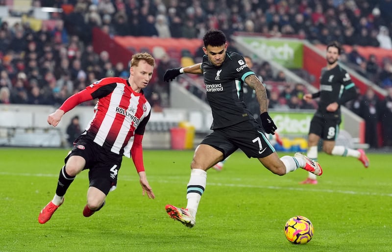 Liverpool's Luis Diaz shoots under pressure from Brentford's Sepp van den Berg. Photograph: Adam Davy/PA