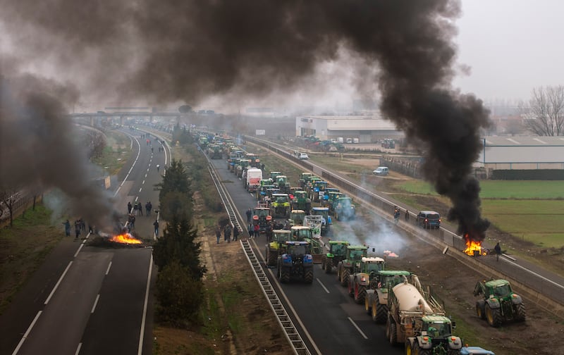 Farmers make barricades after blocking a highway during a protest near Mollerussa, northeast Spain, on February 6th. Photograph: Emilio Morenatti/AP