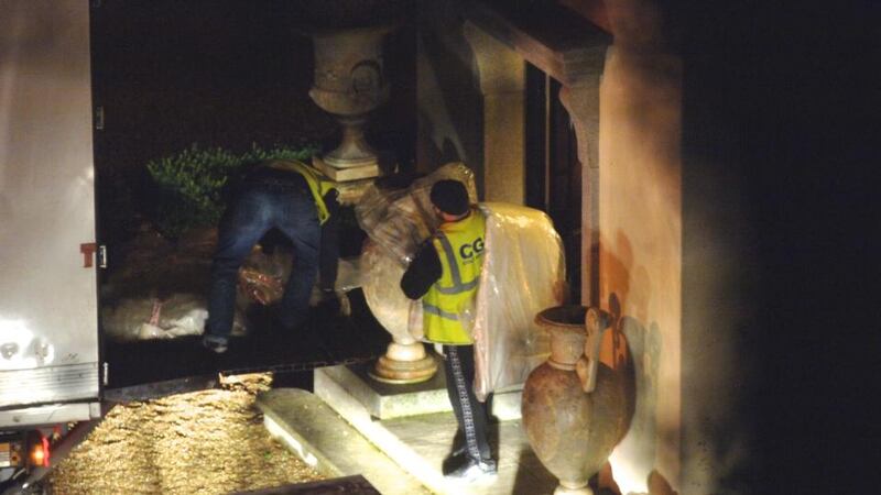 A furniture removal team is seen removing furniture and other items from the O’Donnells former property, Gorse Hill, on Vico Road in Killiney on Thursday night. Photograph: Justin Farrelly Photos.