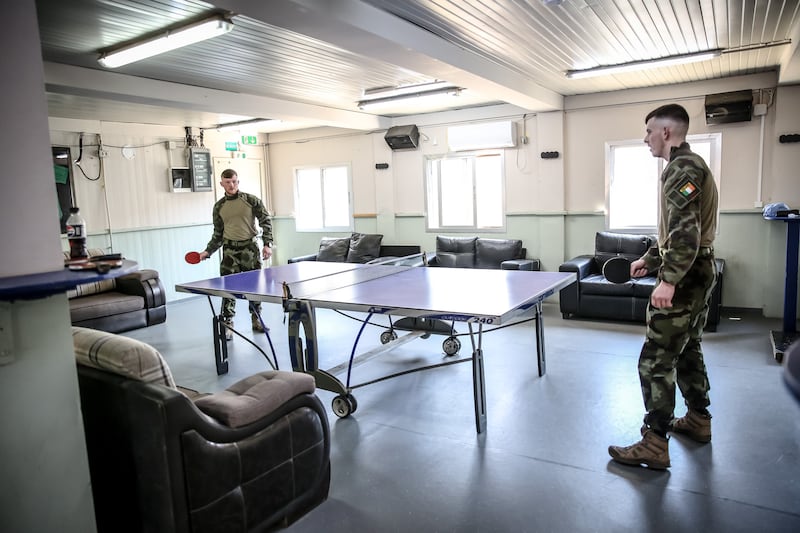 Irish peacekeepers play table tennis in the Camp Shamrock recreation room. Photograph: Sally Hayden