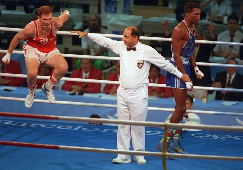 Michael Carruth celebrates winning a gold medal at the 1992 Barcelona Olympics. Taken on Canon 70/200mm f2.8 lens on colour film 500th sec @ f2.8. Photo: James Meehan/Inpho