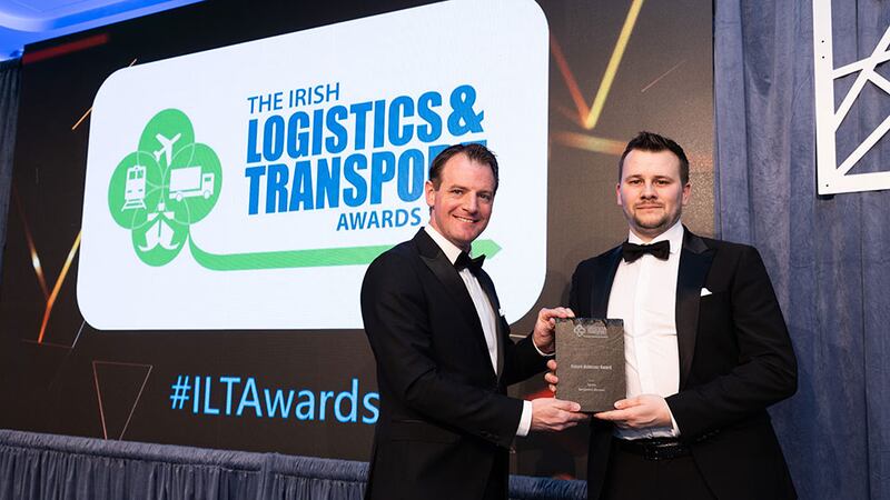 Seamus Kavanagh, executive officer of Irish International Freight Association presents the future achiever award to Benjamin Barnes, Sysco