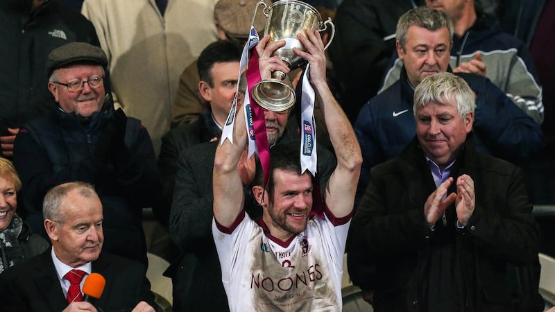 Francis McEldowney lifts the  cup after Slaughtneil’s win over Kilcoo in the Ulster senior club football final. Photograph: Presseye/Inpho