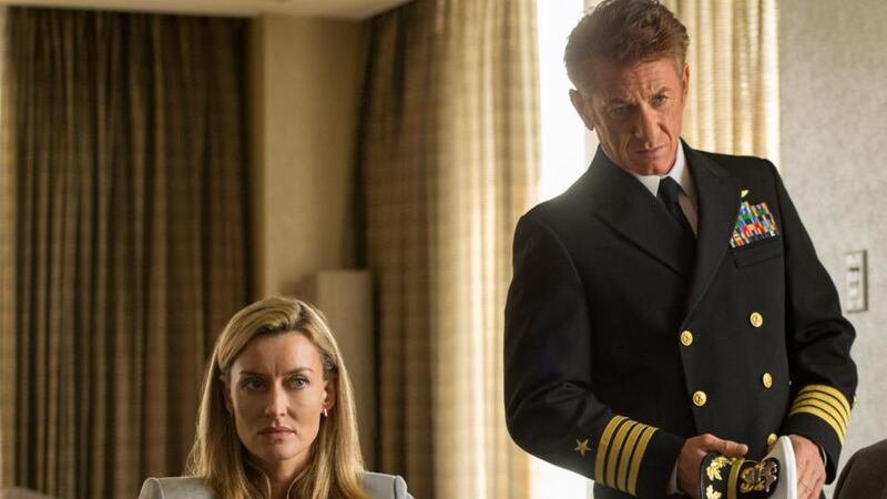 Natascha McElhone and Sean Penn (centre) in The First