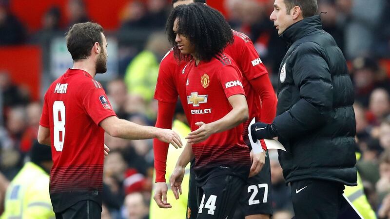 Tahith Chong replaces Juan Mata to make his Manchester United debut against Reading. Photograph: Martin Rickett/PA