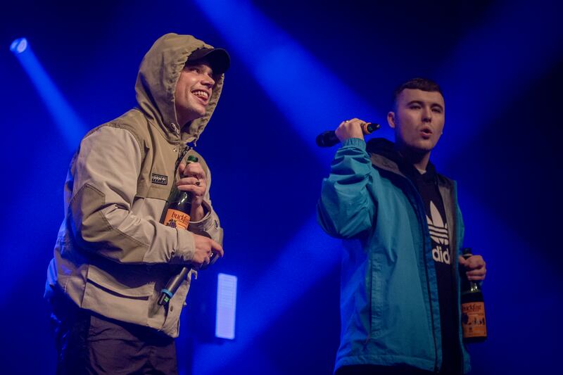 Móglaí Bap and Mo Chara of Kneecap performing at the 3Olympia Theatre. Photograph: Tom Honan