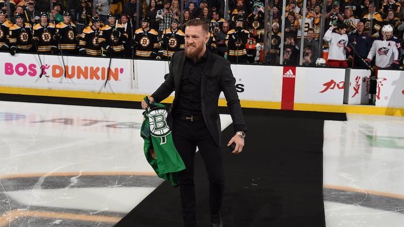 McGregor gets ready to drop the puck before the NHL game between the Boston Bruins and the Columbus Blue Jackets at the TD Garden. Photo: Steve Babineau/NHLI via Getty Images