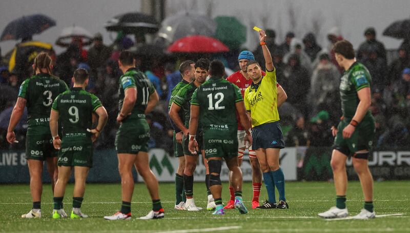 Referee Chris Busby shows the yellow card to Connacht's Byron Ralston after a clearout that led to an injury to Jack O'Donoghue. Photograph: James Crombie/Inpho