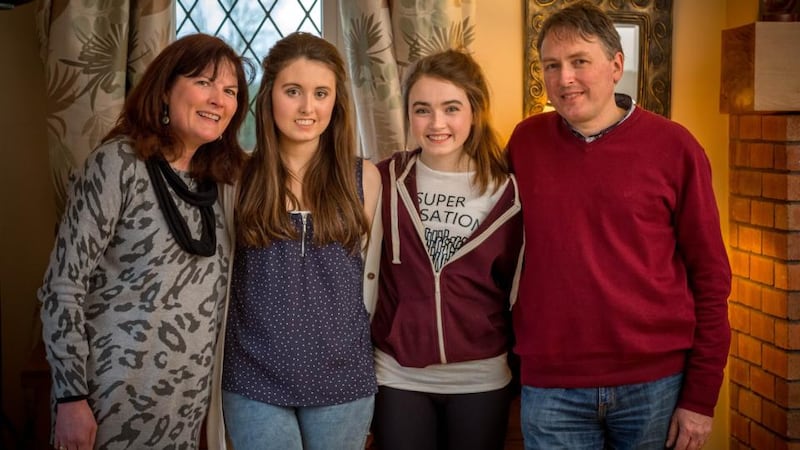 Emily Felix (second from left) at home in Gowran, Co Kilkenny with her mother, Marie, sister, Anna, and her father, Charles. Photograph:  Dylan Vaughan