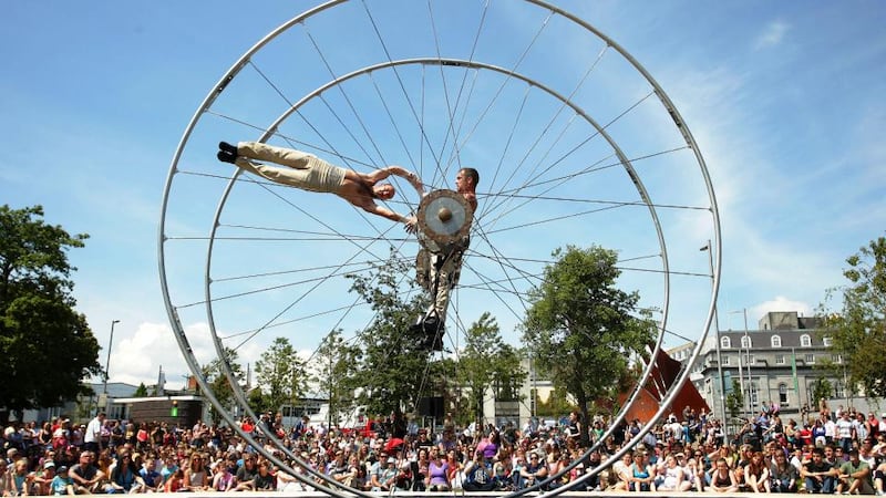 An acrobatic show at Eyre Square during Galway Arts Festival