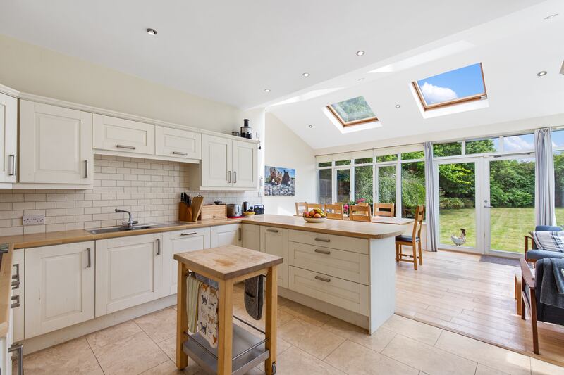 A bright kitchen/dining extension lies to the rear