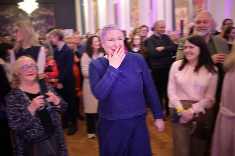 Amanda Dunsmore reacts on her way to accept the National Gallery of Ireland’s AIB Portrait Prize. Photograph: Chris Maddaloni/The Irish Times