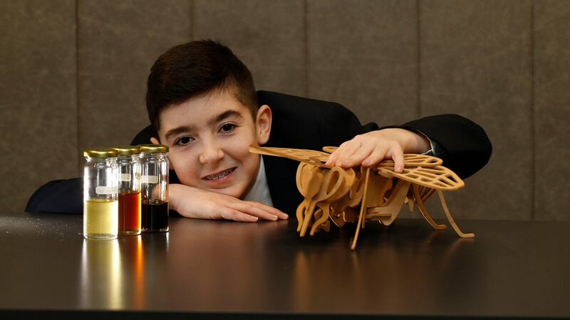 Rian Byrne, a pupil at Coláiste Chill Mhantáin, Co Wicklow, with elements of his project looking at how effectiveness of honey as a health food can be measured. Photograph Nick Bradshaw