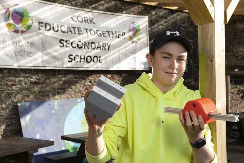 Student Harry O’Connor,  from Cork Educate Together,  showcases  his project, ‘the design and development of a bipedal robot for home care’. Photograph:  Fennell Photography